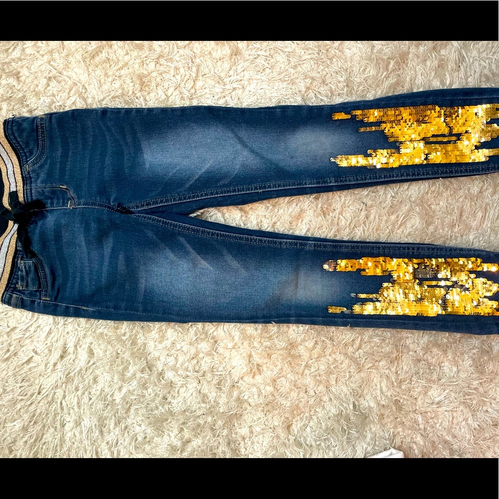 Blue jeans with gold sequin